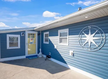 Beautifully updated waterfront home great for families & friends +beach badges.