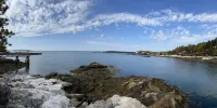 Renovated 3-BR boathouse built atop water in quiet cove; private float & trails - Wifi