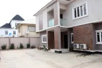 3 out of 4 bedroom house ,located in a Safe, quiet, highly secured gated estate Hotels in Ojokoro