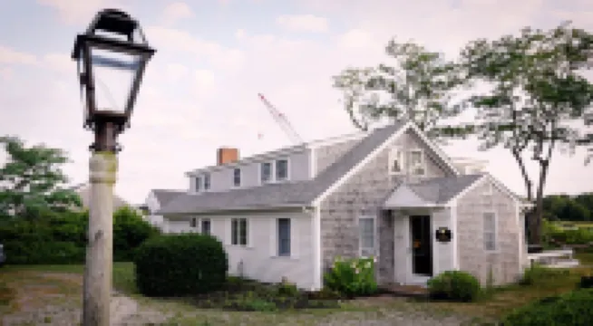Walk to Rock Harbor Beach from your spacious Orleans coastal retreat