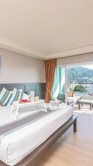 ห้องดีลักซ์เตียงใหญ่หรือเตียงแฝดพร้อมวิวทะเล