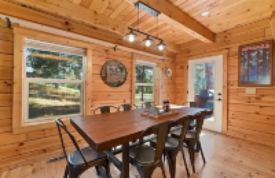 Log cabin with game room by skiing & lake