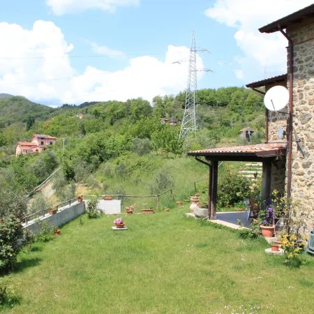 Holiday Home in Mulazzo with Natural Pond