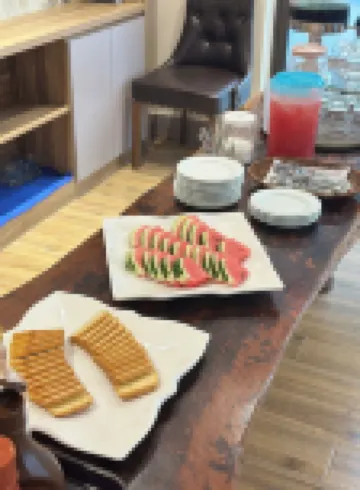 越華酒店及公寓