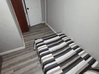 Bright & Cozy 2-Bedroom Main Floor Suite Hotels in Brampton
