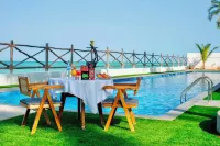 Sea Side Resort - مسبح غير متناهي