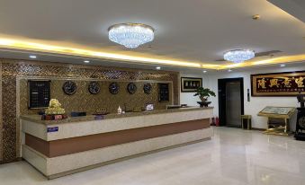 Wuchuan Minghao Business Hotel