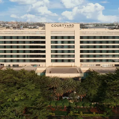 Courtyard Pune Chakan Hotels near Ambika Mangal Karyalay, Shiroli