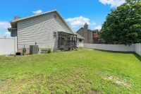 Spacious 5-bedroom retreat with AC and WiFi inSouth Ogden.  Relax in our Hot Tub