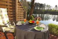 Comfortably furnished apartments, barrier-free with a large terrace on the lake Hotels in Friedeburg