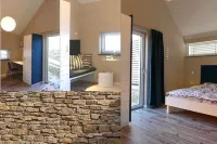 Modern detached vacation home for two on the edge of the village in the Bavarian Rhön.