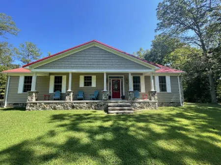 Relaxing Private Riverfront Retreat with Beach and Private Dock