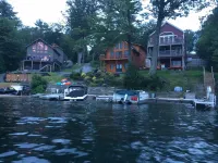 Beautifully appointed lake-view cottage with dock access