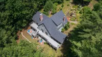 Waterfront Home with ample outdoor entertainment space on Thompson Lake
