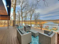 Lakefront Getaway w Boat Slip, Sandy Beach, 2 Living Rooms. Sleeps 12