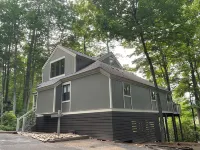 Breathtaking lake views, steps from beach, golf, and clubhouse. Renovated home!