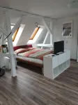 One-room apartment above the roofs of downtown Erfurt