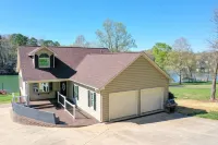 Pristine lake house offering watersports, gameroom favorites, and stunning view