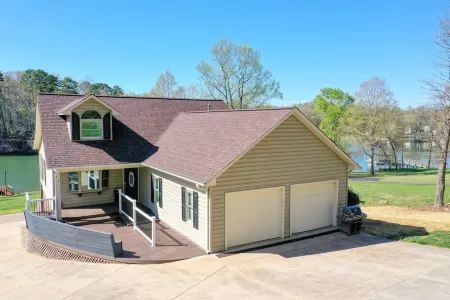 Pristine lake house offering watersports, gameroom favorites, and stunning view