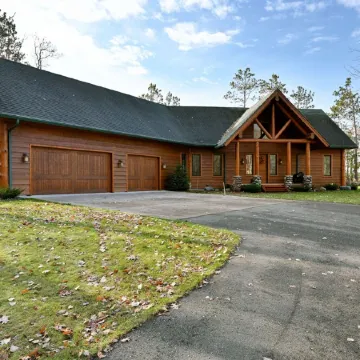 Custom-Built Log Cabin Family Friendly Home on Round Lake, Close to Trails!