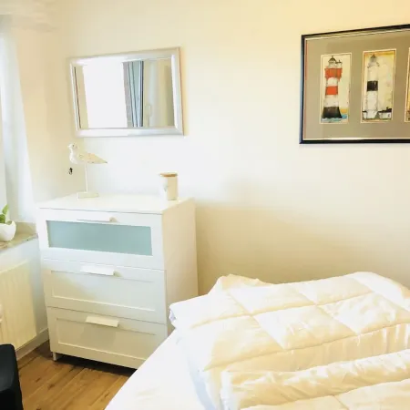 Small holiday apartment in Dornumersiel with a dog