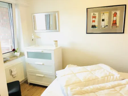 Small holiday apartment in Dornumersiel with a dog