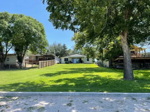 Open modern concept home with large backyard on Lake LBJ with Private Casita!