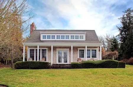 Beautiful Waterfront Cape Cod Style Beach Estate