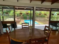 Cranley Garden Retreat with Fireplace & Pool