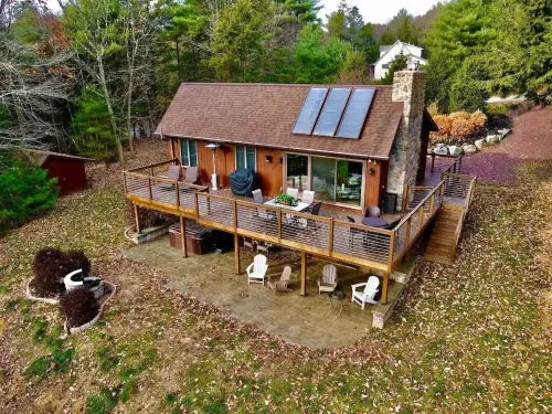 Cozy chalet with hot tub and ski resort view