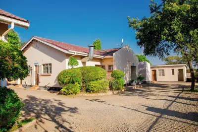 Mosi-O-Tunya Executive Lodge โรงแรมใน