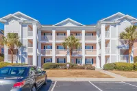 Indoor and Outdoor Pools with Golf Course Views - Charming Retreat Hotels in Carolina Forest