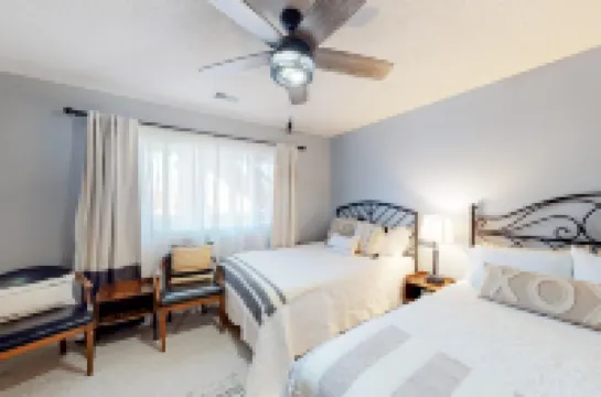 All-season retreat on golf course with indoor/outdoor pools, hot tub, central AC