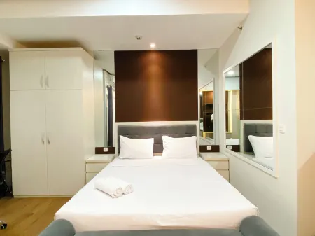 Cozy and Homey Studio at Vasanta Innopark Apartment Отели рядом с достопримечательностью «Bonecom Tricom Mm2100»