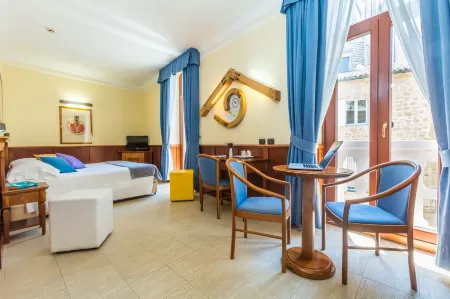 Hotel Duomo Отели рядом с достопримечательностью «Колодец Святого Патрика»