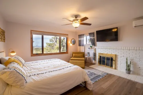 NEW! Mountain views, arcade, hot tub, 3000sqft