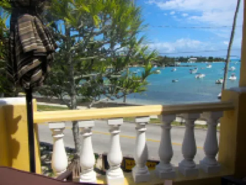 Private and Dreamy.....Balcony, Wine, Sunset,  Upstairs with its own entrance! Hotels in Sandys