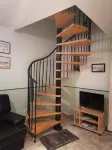 Cottage with private garden in wooded property with swimming pool