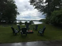 Escape to the Northwoods at this picturesque Sand Lake home