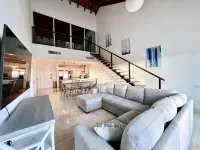 Beautiful top floor beach front condo in the center of cap cana.
