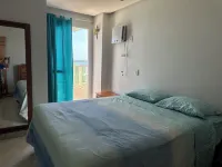 Apart de Luxo de frente para a PRAIA DO MORRO! 4 suítes, 3 vagas, ar cond, WIFI