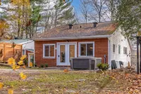 Rarely offered 2 waterfront cottages with 2 hot tubs side by side!