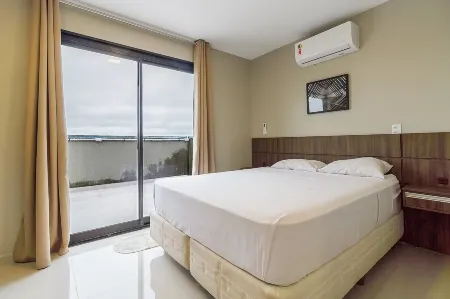 Pleione Flats Отели рядом с достопримечательностью «Botanical Garden of Curitiba»