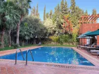 Villa piscine chauffée PV,Clim,3sdb,4ch,Staff disp Hotel a Bouzama