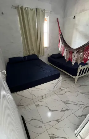 Airy house with swimming pool, 5 minutes from Farol beach. The perfect getaway! Отели в г. Паракуру