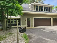 Carriage House guest house located in quaint FISHTOWN, Leland, Michigan, US Hotels near Van's Beach