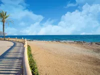 Comfort Steps from the Sea