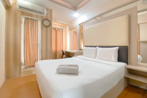 Warm Tone Studio at Candiland Apartment By Travelio