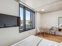 Habyt-The Waterfront Отели рядом с достопримечательностью «Конференц-центр COLONIA NOVA»