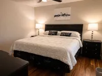Cozy Retreat with Rooftop Pool, Parking, and Spacious Comfort